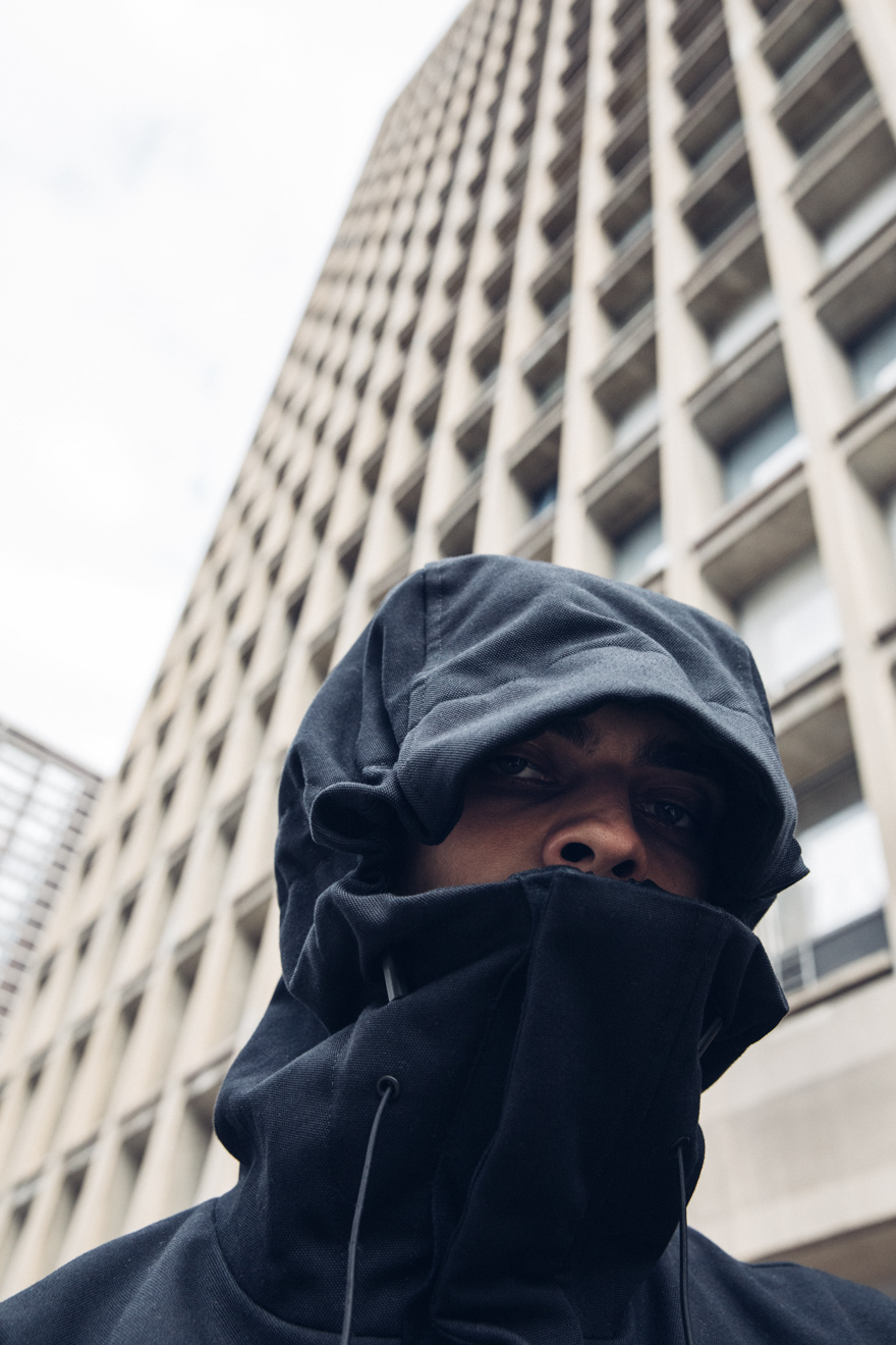 Outlier - Duckcloth Slash Fortress (story, close up, hood up)