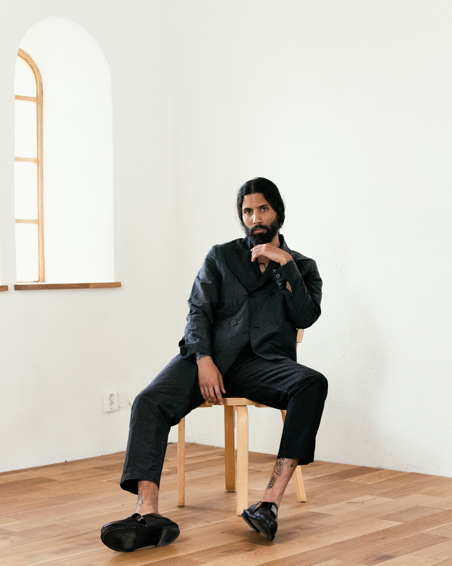Outlier - Injected Linen Pleated Pants (story, moley seated, eye contact)