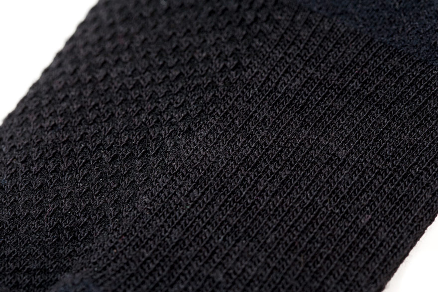 Outlier - Megafine Merino Socks (flat, black macro)