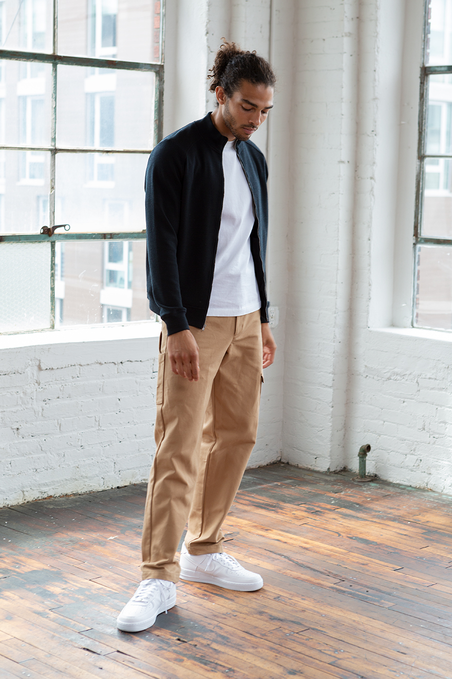 Outlier - Warmform Merino Zipfront (story, standing looking down)